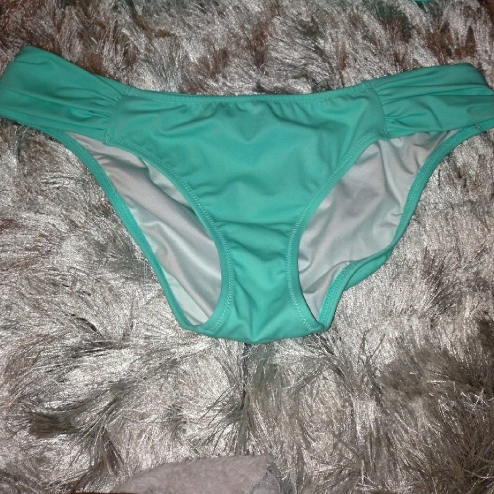 Brand new never worn vs bikini bottoms!